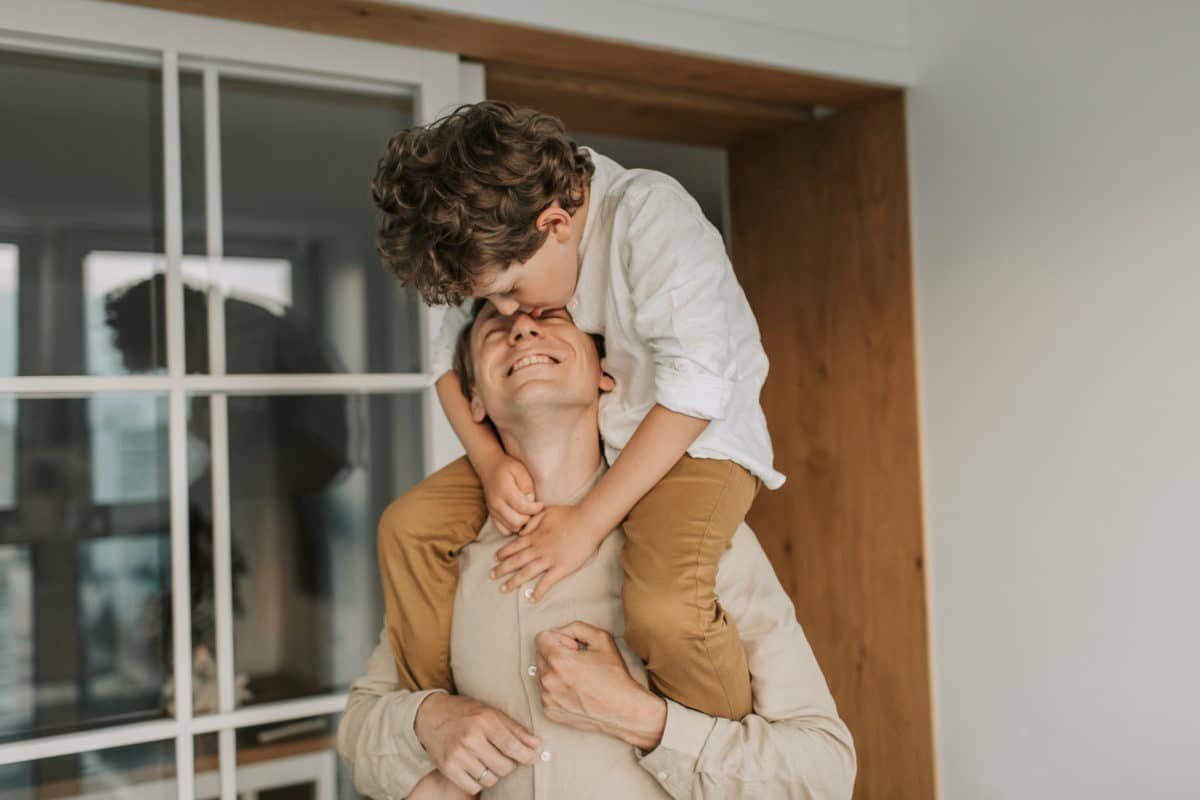 Child hugging parent after being appointed with an independent children's lawyer